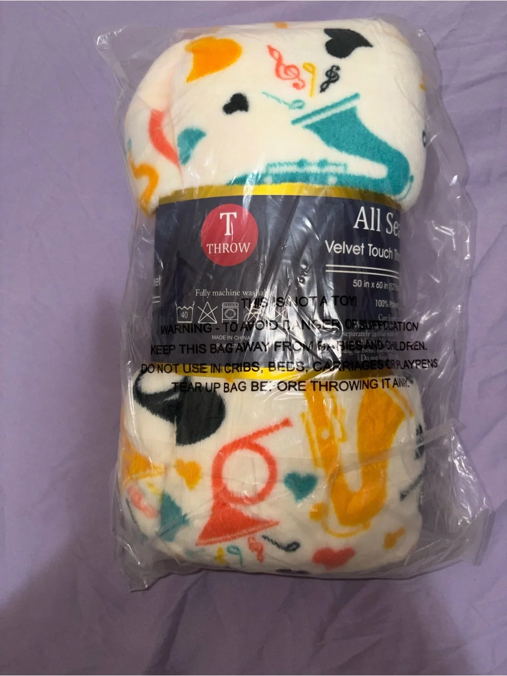 Target White Fleece Throw Blanket with Multicolor Music Print